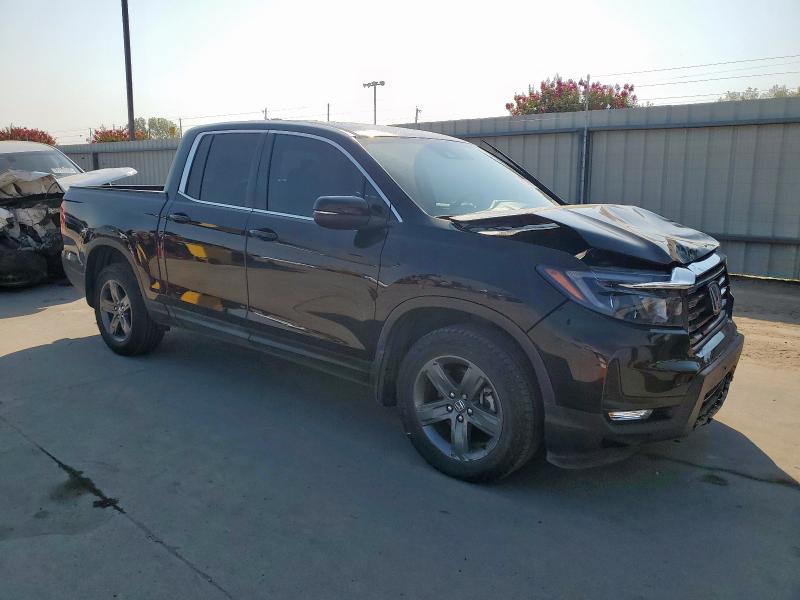 Photo 4 from auction – 2023 HONDA RIDGELINE with VIN 5FPYK3F58PB037415