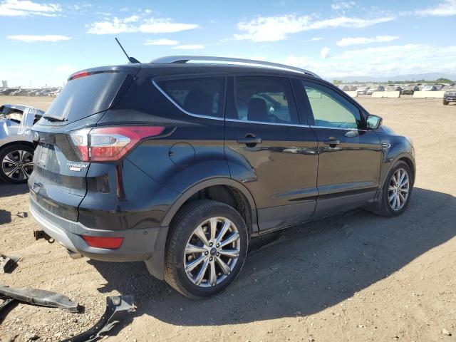 Photo 3 from auction – 2018 FORD ESCAPE TIT with VIN 1FMCU9J91JUA31105