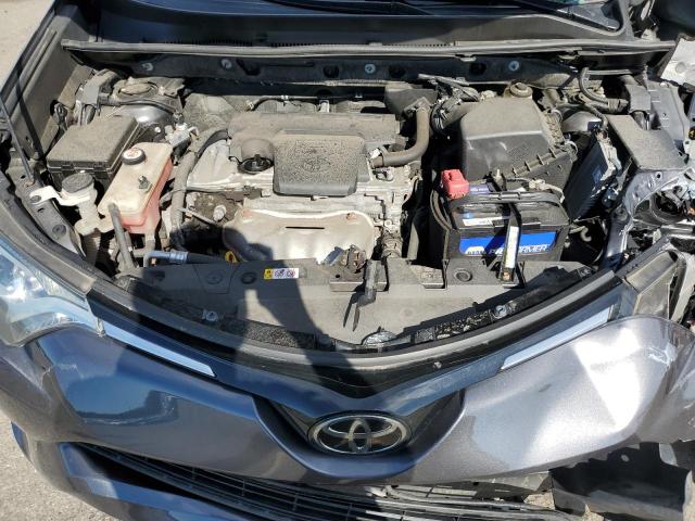 Photo 12 from auction – 2018 TOYOTA RAV4 LE with VIN JTMBFREV4JJ227848