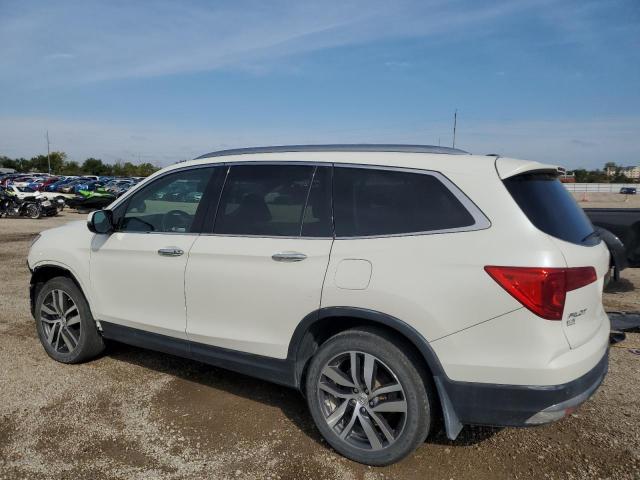 Photo 2 from auction – 2017 HONDA PILOT TOURING with VIN 5FNYF6H94HB095974