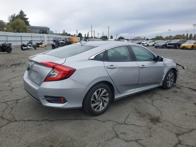 Photo 3 from auction – 2018 HONDA CIVIC EX with VIN 2HGFC2F75JH533073