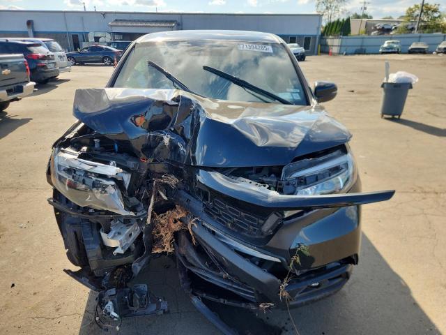 Photo 5 from auction – 2021 HONDA PASSPORT E with VIN 5FNYF8H51MB010088
