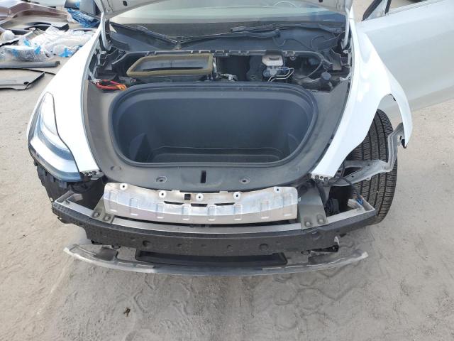 Photo 12 from auction – 2021 TESLA MODEL Y with VIN 5YJYGDEE9MF209321