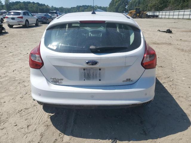 Foto 6 de la subasta – 2014 FORD FOCUS SE con VIN 1FADP3K26EL378980