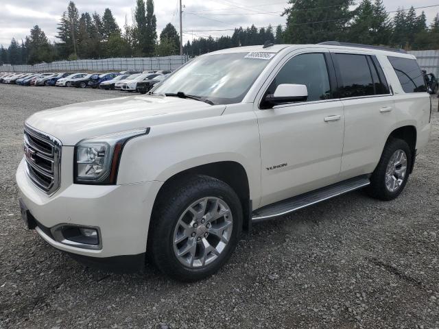 GMC YUKON SLT 2015 with VIN 1GKS2BKC1FR130318 - Photo from auction
