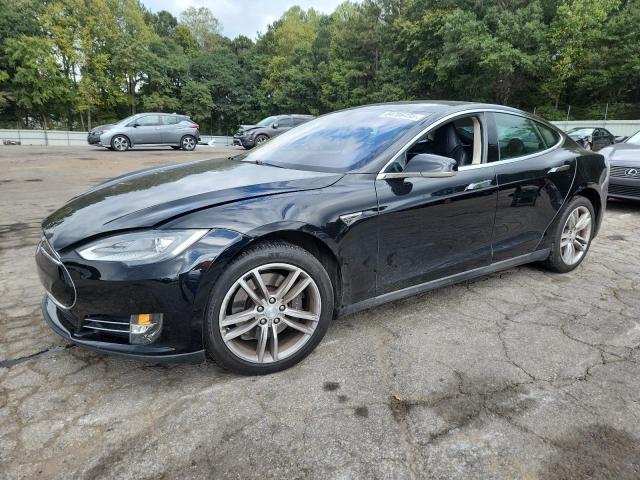 TESLA MODEL S 2013 with VIN 5YJSA1CNXDFP16673 - Photo from auction