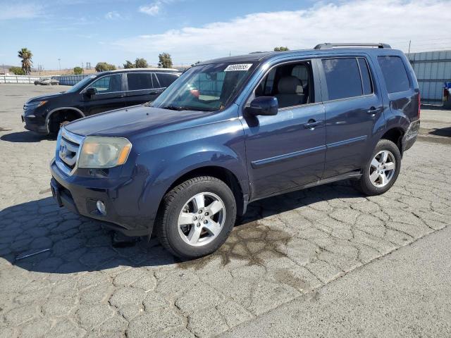 HONDA PILOT EXL 2011 with VIN 5FNYF4H52BB049276 - Photo from auction