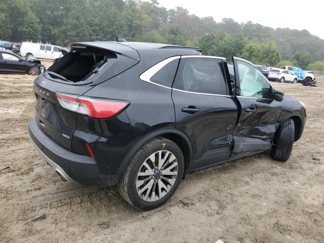 Photo 3 from auction – 2020 FORD ESCAPE TITANIUM with VIN 1FMCU9DZ1LUA95398