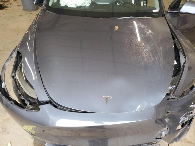 Photo 11 from auction – 2023 TESLA MODEL Y with VIN 7SAYGAEE5PF934680