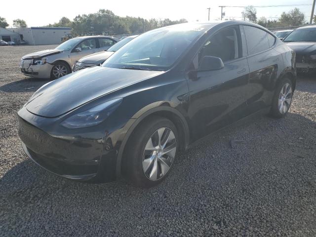 TESLA MODEL Y 2023 with VIN 7SAYGAEE5PF930399 - Photo from auction