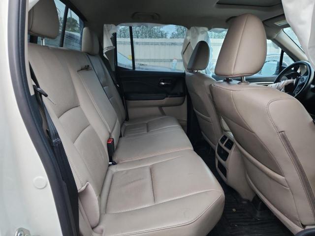 Photo 10 from auction – 2019 HONDA RIDGELINE with VIN 5FPYK2F68KB000716