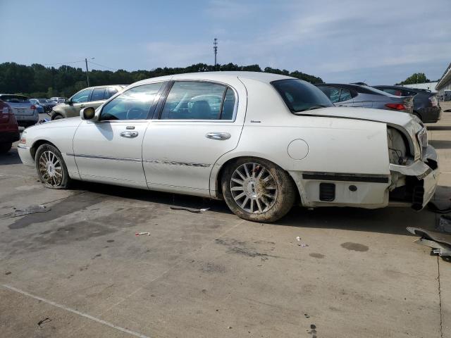 Photo 2 from auction – 2004 LINCOLN TOWN CAR U with VIN 1LNHM83W94Y635355