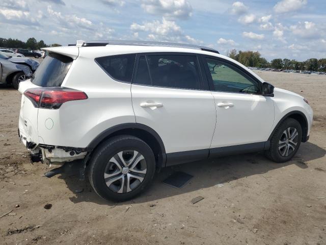 Photo 3 from auction – 2016 TOYOTA RAV4 LE with VIN JTMBFREV0GJ068478