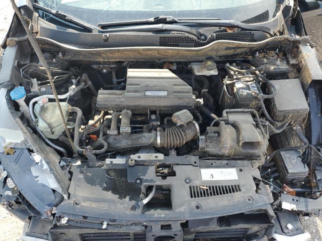Photo 12 from auction – 2018 HONDA CR-V with VIN 7FARW2H87JE082523