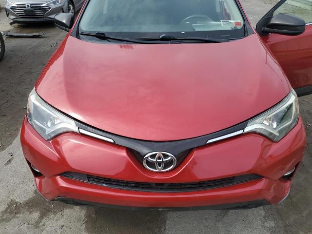 Photo 11 from auction – 2016 TOYOTA RAV4 with VIN JTMBFREV8GJ103798