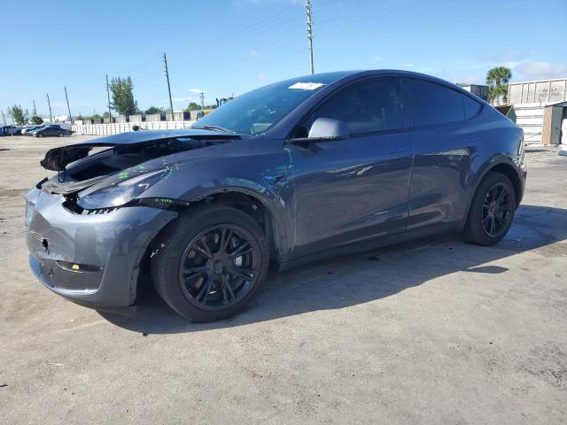 TESLA MODEL Y 2023 with VIN 7SAYGDEE8PF699998 - Photo from auction