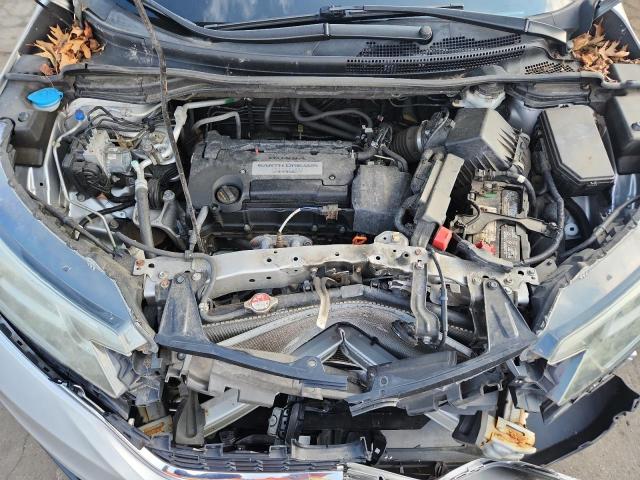 Photo 12 from auction – 2015 HONDA CR-V LX with VIN 5J6RM4H31FL033513