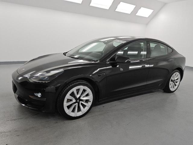 TESLA MODEL 3 2022 with VIN 5YJ3E1EA2NF287615 - Photo from auction