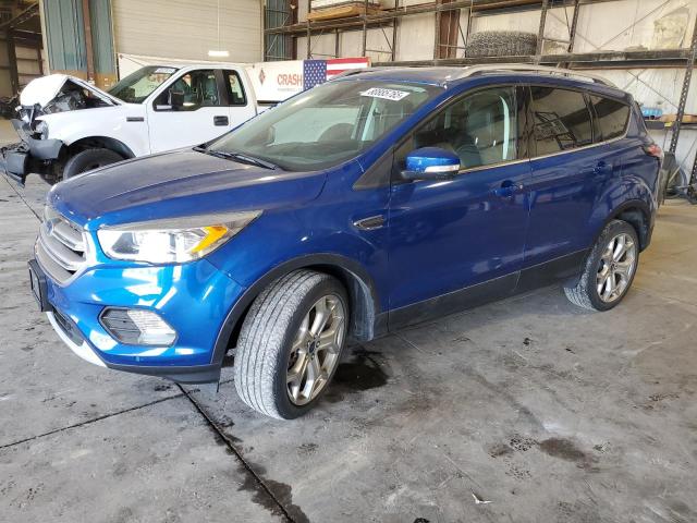 FORD ESCAPE TIT 2017 with VIN 1FMCU9J94HUC85210 - Photo from auction
