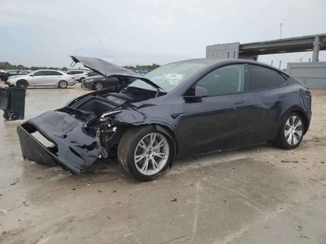 TESLA MODEL Y 2024 with VIN 7SAYGDEE9RA253200 - Photo from auction