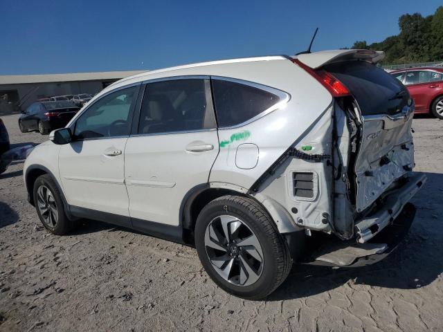 Photo 2 from auction – 2016 HONDA CR-V TOURING with VIN 5J6RM4H90GL007023