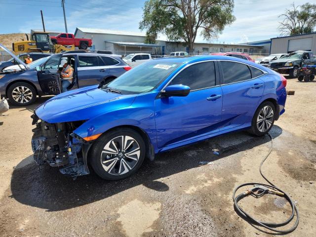 HONDA CIVIC EX 2018 with VIN JHMFC1F39JX035345 - Photo from auction