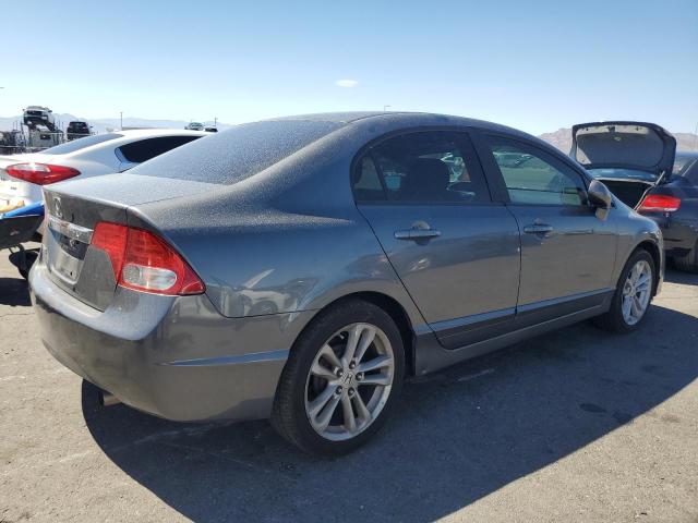 Photo 3 from auction – 2010 HONDA CIVIC LX with VIN 19XFA1F50AE073829