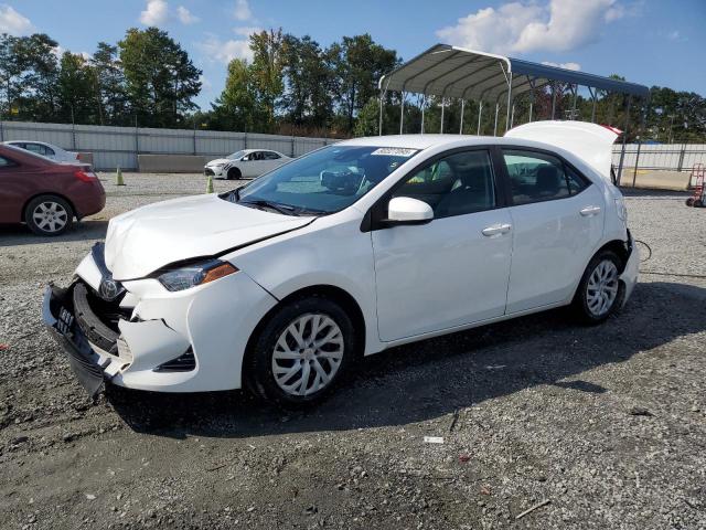 TOYOTA COROLLA L 2018 with VIN 5YFBURHE8JP802482 - Photo from auction