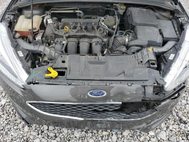 Photo 11 from auction – 2015 FORD FOCUS SE with VIN 1FADP3F25FL204569