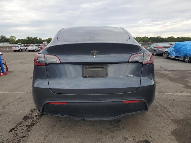 Photo 6 from auction – 2023 TESLA MODEL Y with VIN 7SAYGDEE6PF693505