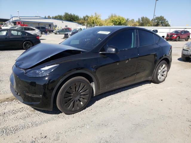 TESLA MODEL Y 2023 with VIN 7SAYGDEEXPF792229 - Photo from auction