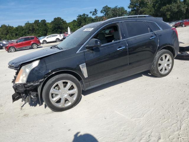 CADILLAC SRX PERFOR 2014 with VIN 3GYFNCE33ES664948 - Photo from auction