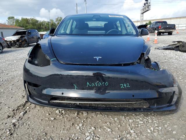 Photo 5 from auction – 2021 TESLA MODEL 3 with VIN 5YJ3E1EBXMF858310