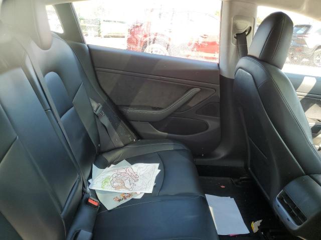 Photo 11 from auction – 2017 TESLA MODEL 3 with VIN 5YJ3E1EA1HF000821