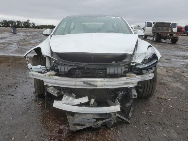 Photo 5 from auction – 2021 TESLA MODEL 3 with VIN 5YJ3E1EB0MF013336