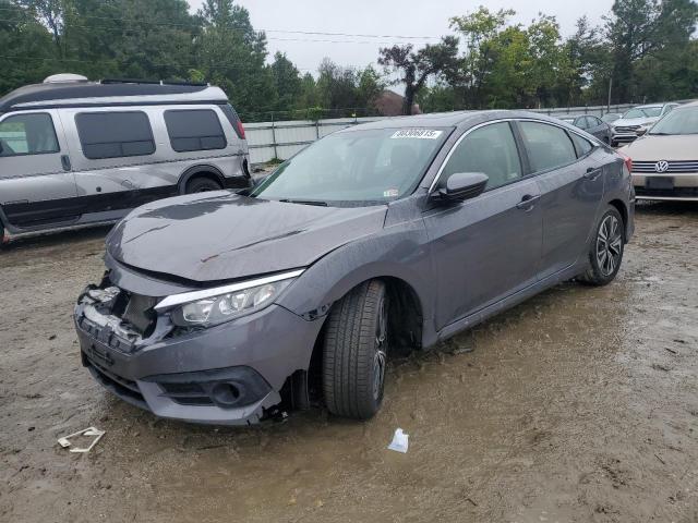 HONDA CIVIC EXL 2018 with VIN JHMFC1F76JX013872 - Photo from auction