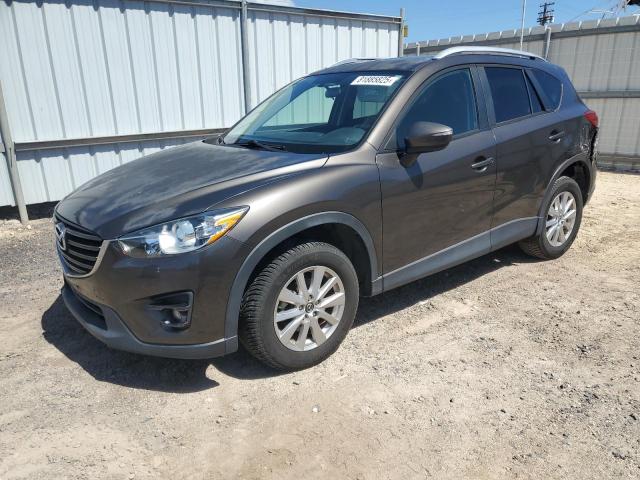 MAZDA CX-5 TOURI 2016 with VIN JM3KE2CY9G0911484 - Photo from auction