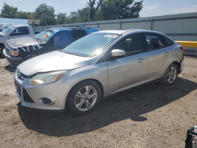 FORD FOCUS SE 2014 with VIN 1FADP3F26EL323102 - Photo from auction