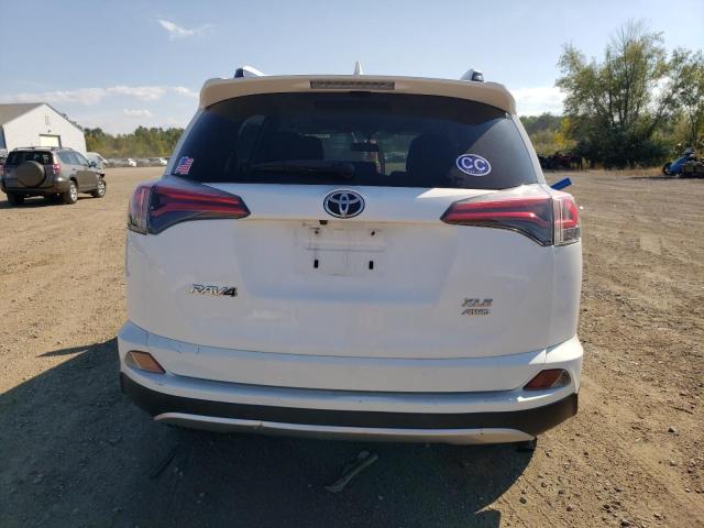 Photo 6 from auction – 2016 TOYOTA RAV4 XLE with VIN JTMRFREV6GJ101269
