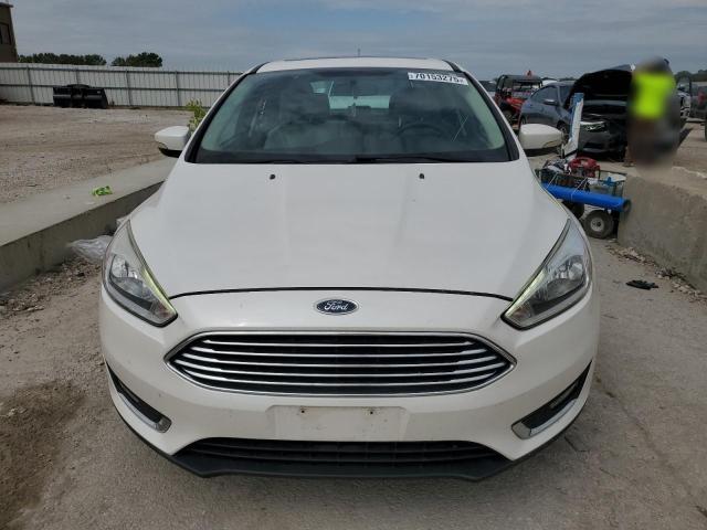 Photo 5 from auction – 2017 FORD FOCUS TITANIUM with VIN 1FADP3J23HL264716