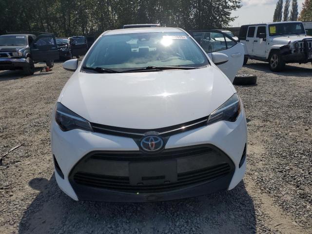 Photo 5 from auction – 2018 TOYOTA COROLLA L with VIN 2T1BURHEXJC964498
