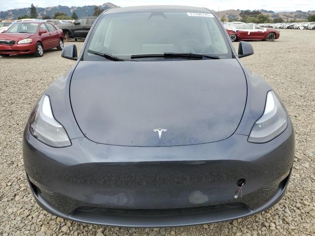 Photo 5 from auction – 2023 TESLA MODEL Y with VIN 7SAYGAEE0PF967733
