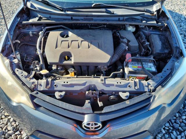 Photo 11 from auction – 2014 TOYOTA COROLLA L with VIN 2T1BURHEXEC013465