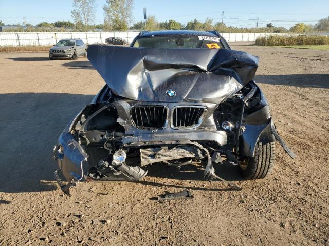 Photo 5 from auction – 2014 BMW X1 XDRIVE2 with VIN WBAVL1C56EVY20536