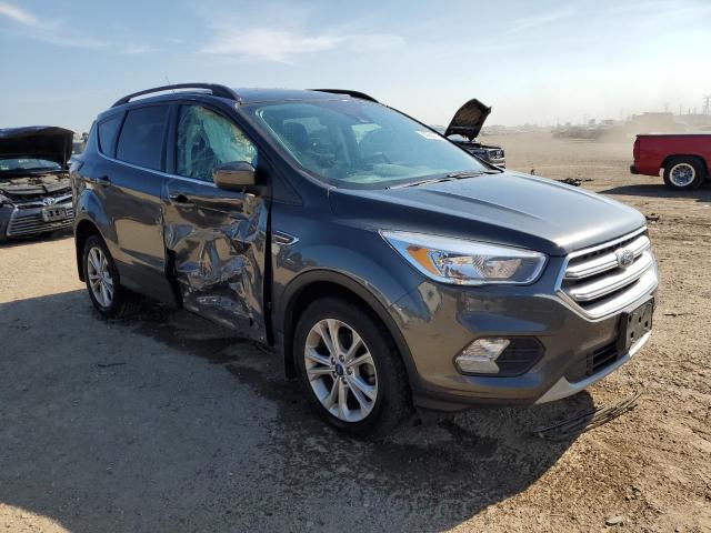 Photo 4 from auction – 2018 FORD ESCAPE SE with VIN 1FMCU0GD7JUB85471