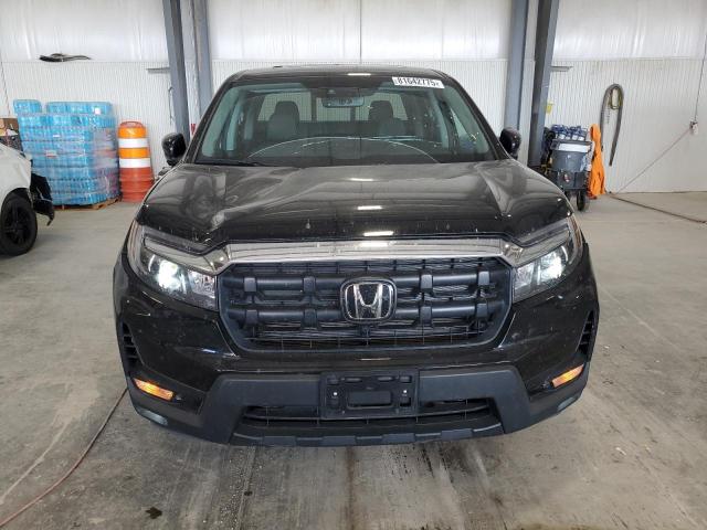 Photo 5 from auction – 2024 HONDA RIDGELINE with VIN 5FPYK3F59RB025860