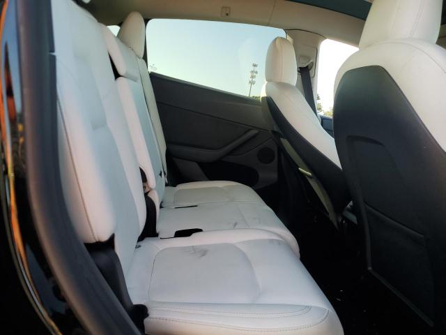 Photo 11 from auction – 2022 TESLA MODEL Y with VIN 7SAYGAEE0NF520218