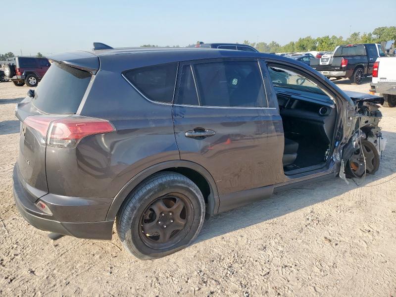 Photo 3 from auction – 2018 TOYOTA RAV4 LE with VIN JTMZFREV7JJ151881