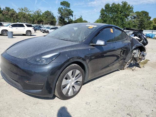 TESLA MODEL Y 2024 with VIN 7SAYGDED5RF092368 - Photo from auction