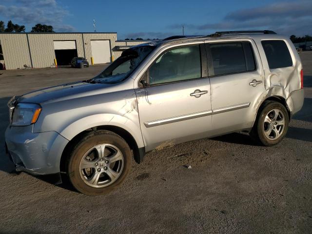 HONDA PILOT EXLN 2014 with VIN 5FNYF3H77EB023448 - Photo from auction